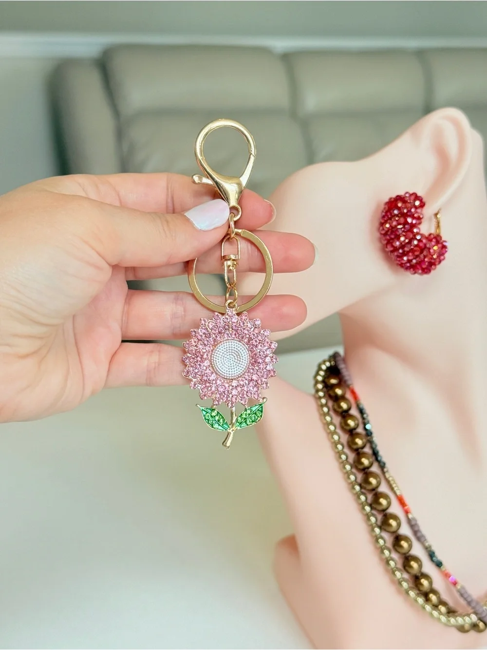 Gold-Tone Pink Crystal Sunflower Keychain with Green Leaves
